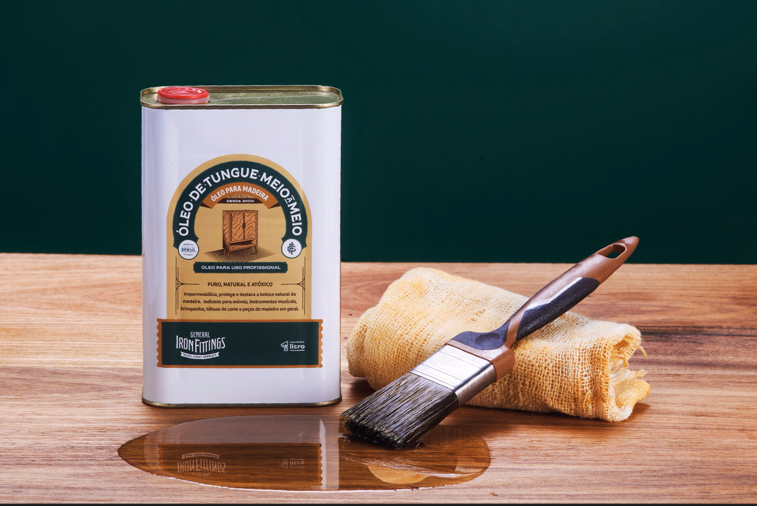 Tin of General Iron Fittings tung oil for wood on a wooden bench, with brush and burlap