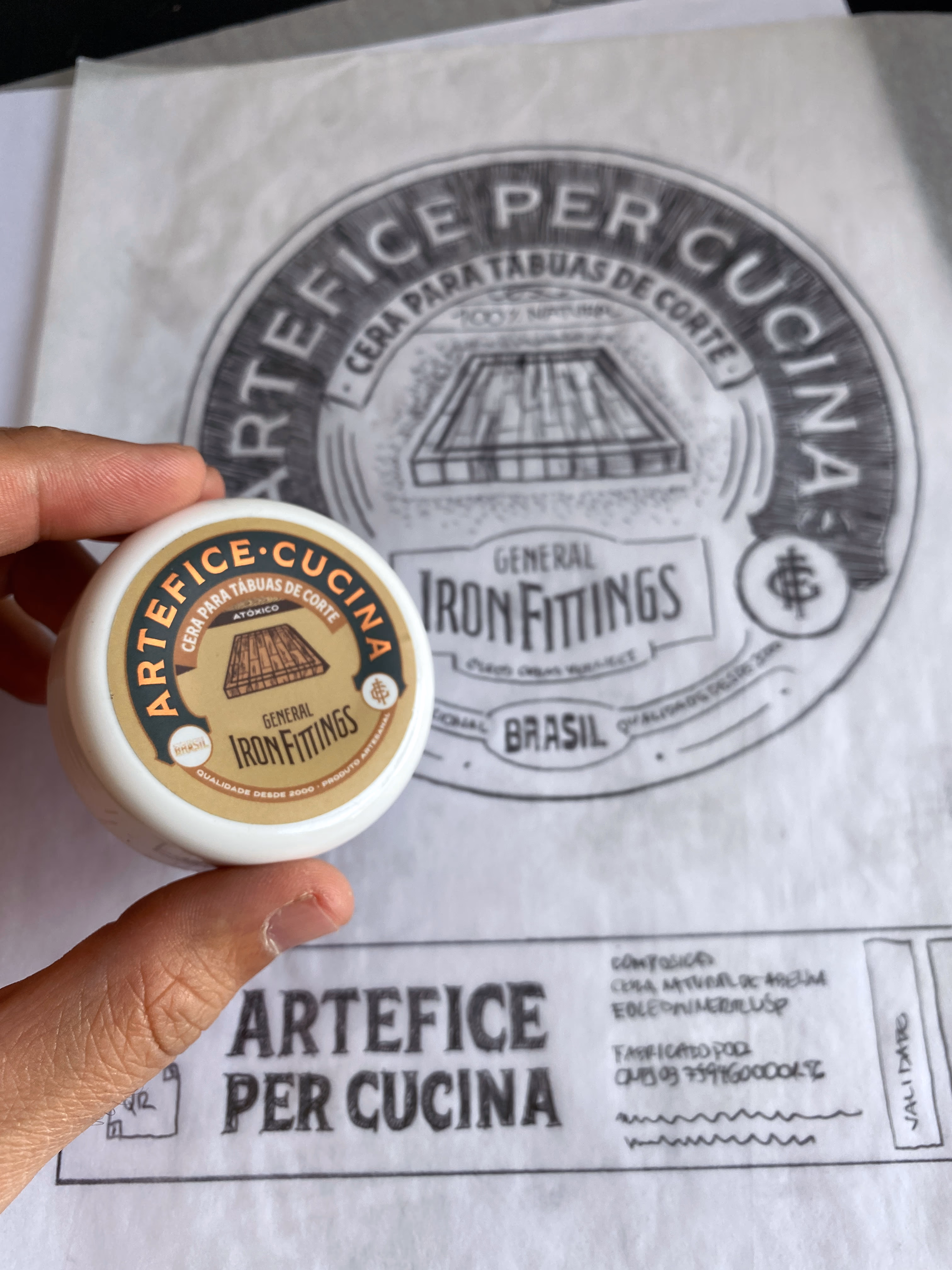 Artefice Cucina wax by General Iron Fittings over the original drawing of the Artefice per Cucina seal